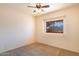 Bedroom with ceiling fan and window at 3731 E Fruitvale Ave, Gilbert, AZ 85297