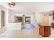 Kitchen with granite island and wood cabinets at 3731 E Fruitvale Ave, Gilbert, AZ 85297