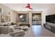 Living room with sliding doors to backyard and modern decor at 3731 E Fruitvale Ave, Gilbert, AZ 85297