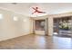 Living room with hardwood floors and sliding glass doors at 3731 E Fruitvale Ave, Gilbert, AZ 85297