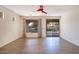 Living room with hardwood floors and sliding glass doors at 3731 E Fruitvale Ave, Gilbert, AZ 85297