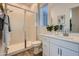 Clean bathroom featuring a walk-in shower and white vanity at 3838 E Kenley Ln, San Tan Valley, AZ 85143