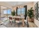 Bright dining area with sliding door access to patio at 3838 E Kenley Ln, San Tan Valley, AZ 85143