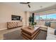 Living room with large window and backyard view at 3838 E Kenley Ln, San Tan Valley, AZ 85143