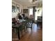 Dining area with table and chairs near sliding glass door at 4038 W Morrow Dr, Glendale, AZ 85308