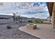 Backyard oasis featuring fire pit, gravel, and artificial turf at 4347 W White Horse Blvd, Eloy, AZ 85131