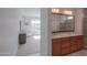 Bathroom with double vanity and large mirror at 4347 W White Horse Blvd, Eloy, AZ 85131