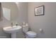 Convenient bathroom with pedestal sink and toilet at 4347 W White Horse Blvd, Eloy, AZ 85131