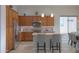 Modern kitchen with island and stainless steel appliances at 4347 W White Horse Blvd, Eloy, AZ 85131