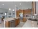 Modern kitchen with stainless steel appliances and an island at 4347 W White Horse Blvd, Eloy, AZ 85131