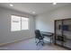 Home office with desk, chair, and built-in shelving at 4347 W White Horse Blvd, Eloy, AZ 85131