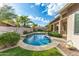 Stunning kidney-shaped pool with surrounding patio and lush landscaping at 4543 E Molly Ln, Cave Creek, AZ 85331