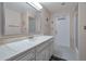 Clean bathroom with updated vanity and large mirror at 4902 E Flossmoor Ave, Mesa, AZ 85206