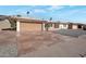 Large driveway with flagstone and a two-car garage at 4902 E Flossmoor Ave, Mesa, AZ 85206