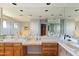 Modern bathroom with double vanity and a large mirror at 5160 N 45Th Pl, Phoenix, AZ 85018