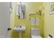 Powder room with pedestal sink and toilet at 5160 N 45Th Pl, Phoenix, AZ 85018