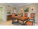 Elegant dining room with a wood table and four chairs at 5160 N 45Th Pl, Phoenix, AZ 85018