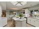 Bright kitchen with white cabinets and an island at 5160 N 45Th Pl, Phoenix, AZ 85018