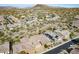 Aerial view of a house in a desert residential area with mountain views at 5626 E Sleepy Ranch Rd, Cave Creek, AZ 85331