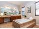 Bathroom featuring a large soaking tub and and sinks at 5626 E Sleepy Ranch Rd, Cave Creek, AZ 85331