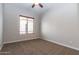 Empty bedroom with carpet floors and a window at 5626 E Sleepy Ranch Rd, Cave Creek, AZ 85331