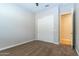 Well-lit bedroom with carpet flooring, double door closet and an additional storage room at 5626 E Sleepy Ranch Rd, Cave Creek, AZ 85331