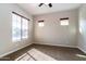 Well-lit bedroom with carpeted floors and large window at 5626 E Sleepy Ranch Rd, Cave Creek, AZ 85331