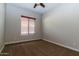 Bright bedroom with carpet flooring and a ceiling fan at 5626 E Sleepy Ranch Rd, Cave Creek, AZ 85331