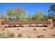 Community park sign surrounded by desert landscaping and desert trees at 5626 E Sleepy Ranch Rd, Cave Creek, AZ 85331