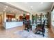 Kitchen and dining area with glass table and four chairs at 5626 E Sleepy Ranch Rd, Cave Creek, AZ 85331