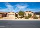 Charming single-story home featuring desert landscaping, paver driveway, and two-car garage at 5626 E Sleepy Ranch Rd, Cave Creek, AZ 85331