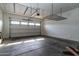 Garage with overhead storage racks and a clean concrete floor at 5626 E Sleepy Ranch Rd, Cave Creek, AZ 85331