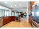 Open kitchen with breakfast bar and view into living room at 5626 E Sleepy Ranch Rd, Cave Creek, AZ 85331