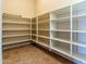 Bright walk-in pantry with adjustable shelving at 5626 E Sleepy Ranch Rd, Cave Creek, AZ 85331