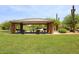 Shaded picnic pavilion in a community park featuring desert landscaping and open green space at 5626 E Sleepy Ranch Rd, Cave Creek, AZ 85331