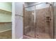 Large walk-in shower with tiled walls and a built-in seat at 5626 E Sleepy Ranch Rd, Cave Creek, AZ 85331