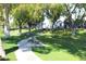 Landscaped community with walking paths and benches at 5735 E Mcdowell Rd # 38, Mesa, AZ 85215