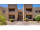 Two-story condo building with central stairwell and landscaping at 5877 N Granite Reef Rd # 2225, Scottsdale, AZ 85250