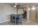 Simple dining area with table and chairs, near kitchen at 5877 N Granite Reef Rd # 2225, Scottsdale, AZ 85250