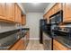 Efficient galley kitchen with granite countertops at 5877 N Granite Reef Rd # 2225, Scottsdale, AZ 85250