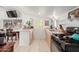 Well-equipped kitchen featuring granite counters and a gas range at 59 N Adams St, Wickenburg, AZ 85390