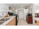 Modern kitchen with stainless steel sink and ample cabinet space at 59 N Adams St, Wickenburg, AZ 85390