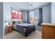 Guest bedroom with mountain views and wooden furniture at 5902 W Gambit Trl, Phoenix, AZ 85083