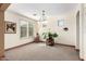 Formal dining room with large windows and a chandelier at 5902 W Gambit Trl, Phoenix, AZ 85083