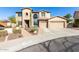 Two-story home with a three-car garage and landscaped yard at 5902 W Gambit Trl, Phoenix, AZ 85083