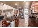 Large kitchen with an island, stainless steel appliances, and granite countertops at 5902 W Gambit Trl, Phoenix, AZ 85083