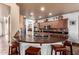 Kitchen island with seating and a large sink, offering lots of counter space at 5902 W Gambit Trl, Phoenix, AZ 85083