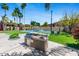 Outdoor grilling area with a built-in sink and nearby seating at 6202 E Mckellips Rd # 83, Mesa, AZ 85215