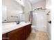 Bathroom with single vanity, tile flooring, and a shower-tub combination at 6202 E Mckellips Rd # 83, Mesa, AZ 85215