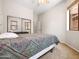 Bedroom featuring neutral carpet, mirrored closet doors, and a ceiling fan at 6202 E Mckellips Rd # 83, Mesa, AZ 85215